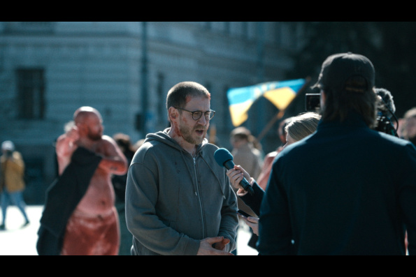 A scene from HOW TO DIVORCE DURING THE WAR, a film by Andrius Blaževičius. A Zeitgeist Films release in association with Kino Lorber.