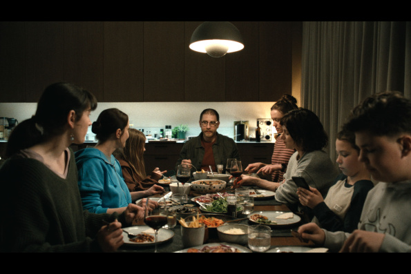 A scene from HOW TO DIVORCE DURING THE WAR, a film by Andrius Blaževičius. A Zeitgeist Films release in association with Kino Lorber.