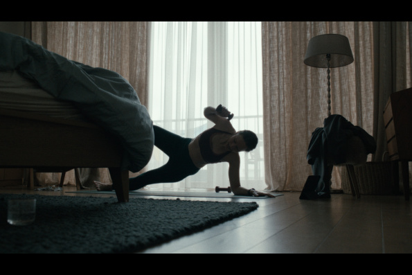 A scene from HOW TO DIVORCE DURING THE WAR, a film by Andrius Blaževičius. A Zeitgeist Films release in association with Kino Lorber.