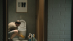 A scene from HOW TO DIVORCE DURING THE WAR, a film by Andrius Blaževičius. A Zeitgeist Films release in association with Kino Lorber.