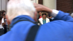 Bill photographing Vogue editor-in-chief Anna Wintour. A scene from BILL CUNNINGHAM NEW YORK. A Zeitgeist Films release.