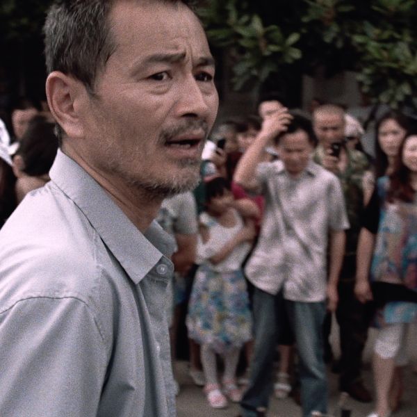 Chen Gang as taxi driver Lao Shi in OLD STONE, a film by Johnny Ma. A Zeitgeist Films release.